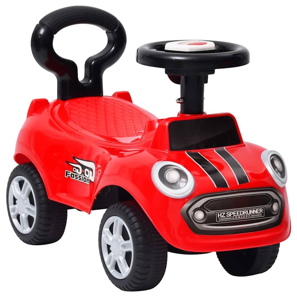 Voiture à pédales rouge
