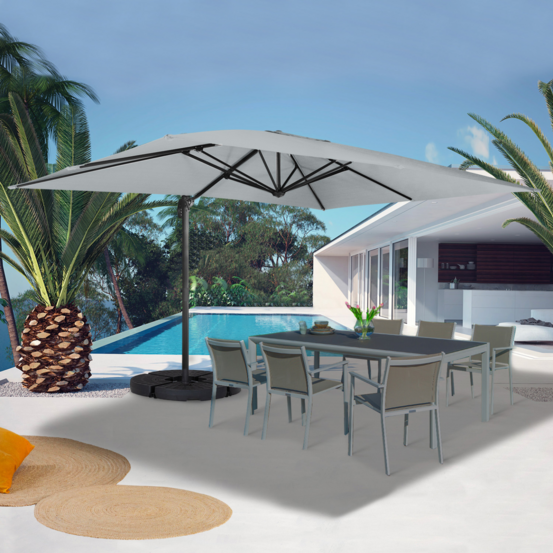 Parasol déporté inclinable rotatif 360 calvi gris clair 3x4 m avec 4 dalles et housse
