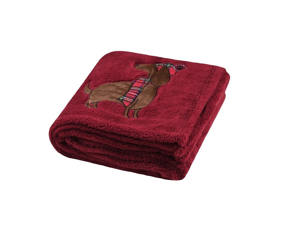 Plaid a poils doux chien avec bonnet rouge