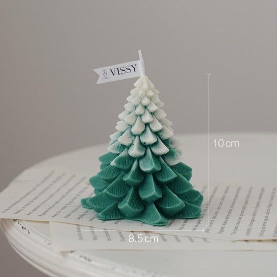 Bougie de noël - sapin vert enneigé