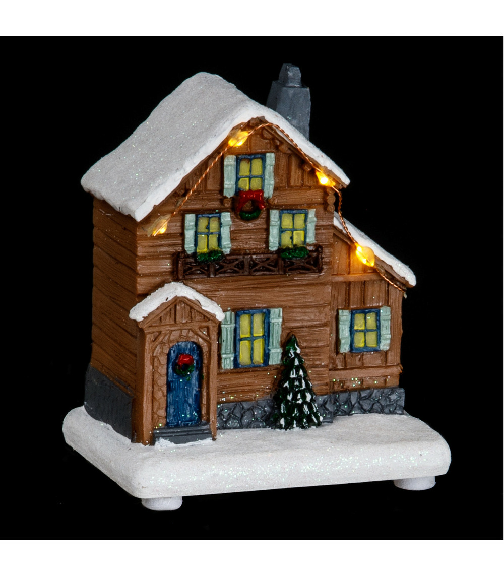 Village de noël lumineux chalet à la montagne