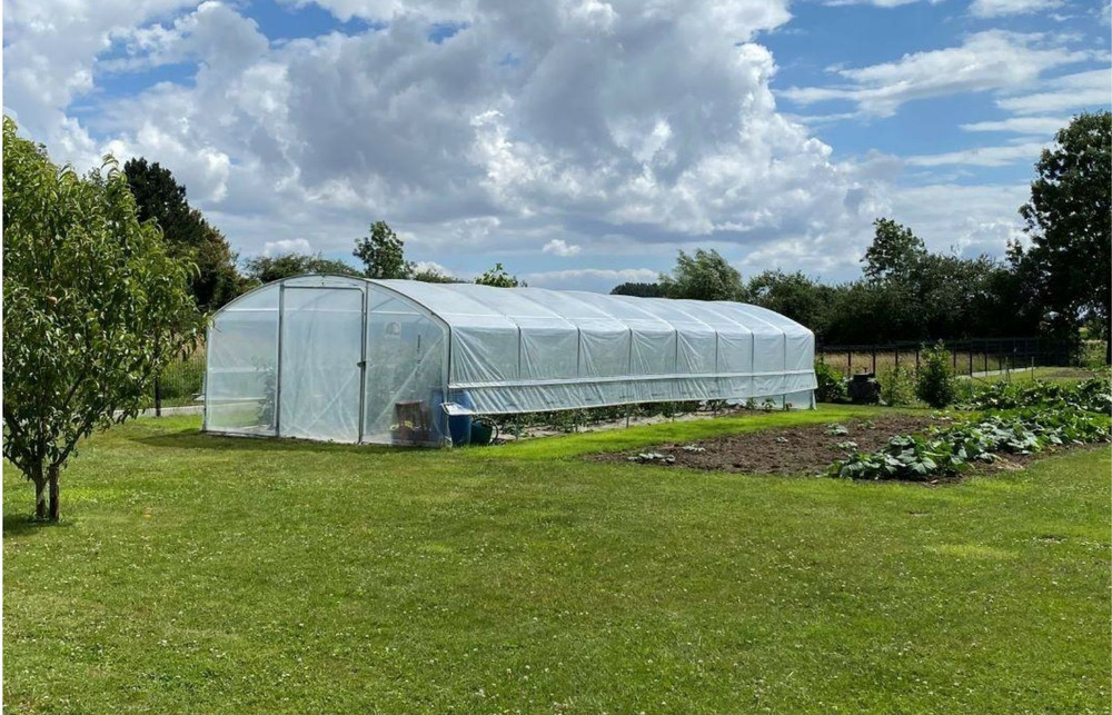 Serre tunnel de jardin - 48m² - 4 x 12m - pieds droits - aérations latérales - 4 saisons plus - les serres tonneau