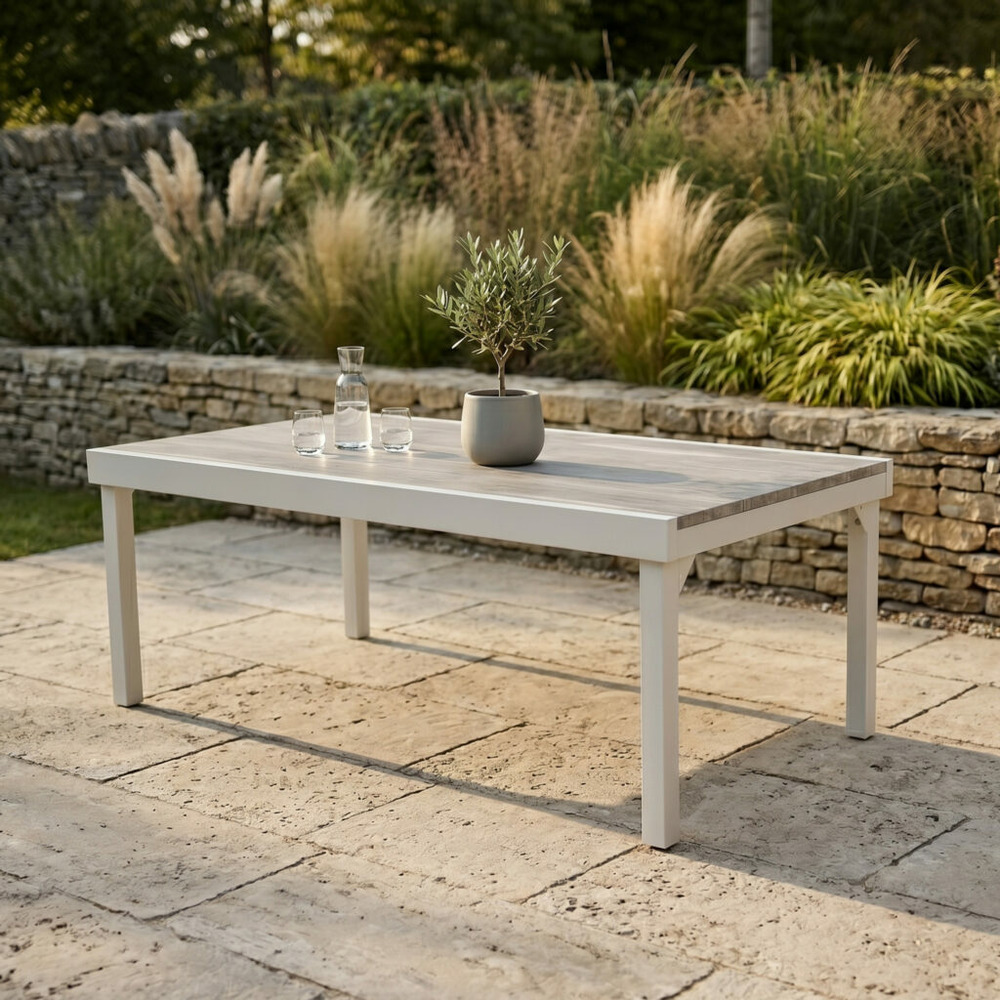 Table modulo 8/12 personnes structure aluminium blanche, plateau en verre décors bois