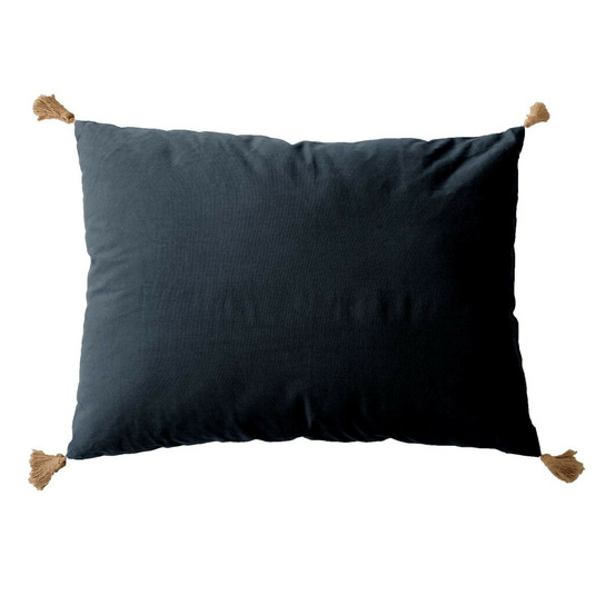 Coussin déco uni à pompons