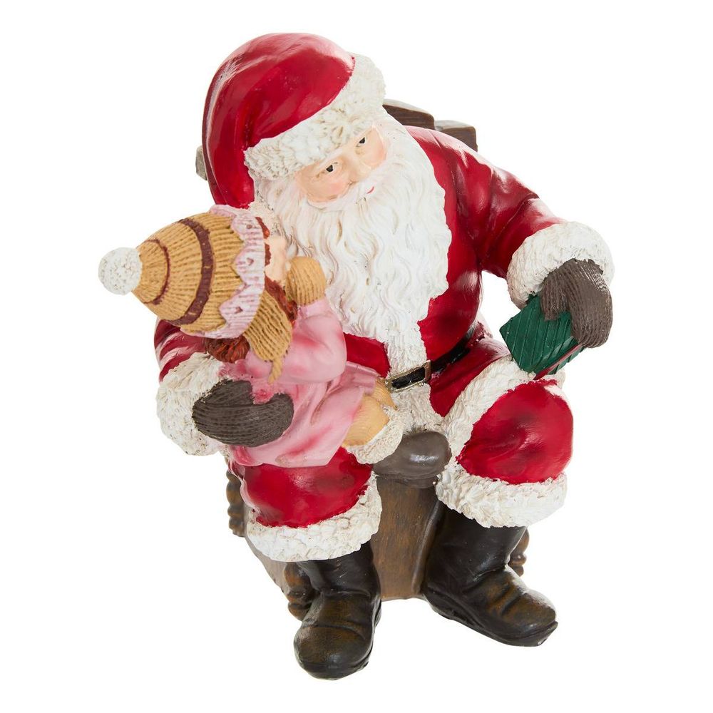 Père noël décoratif dans un fauteuil en résine h. 13,5 cm