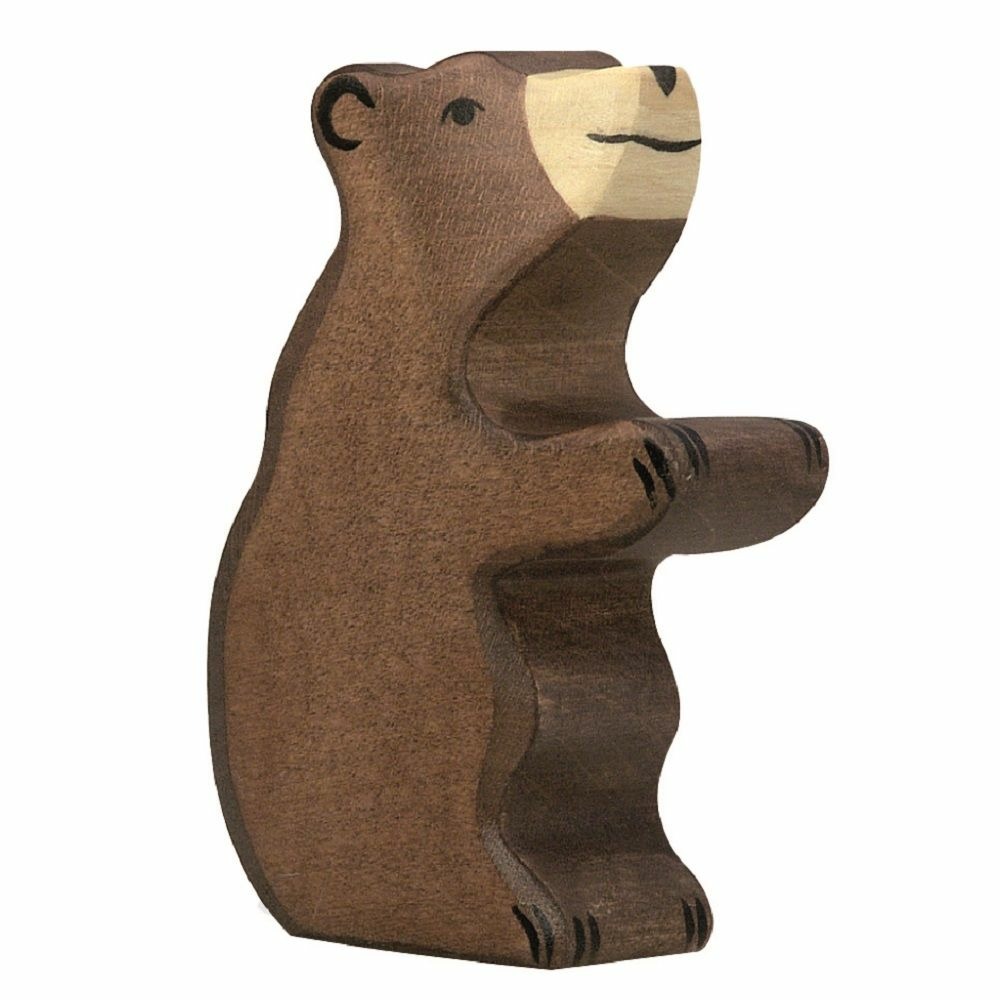 Petit ours brun, assis
