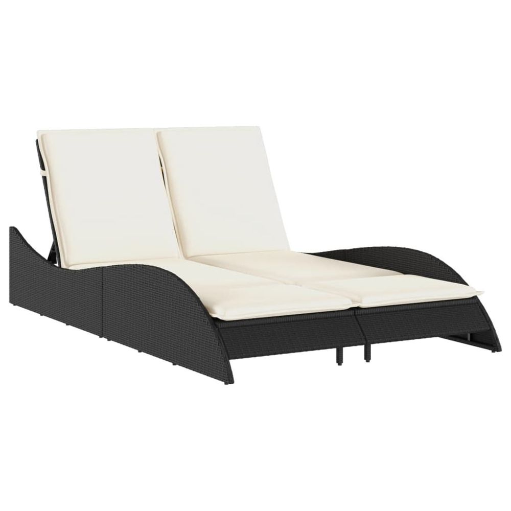 Chaise longue avec coussins noir 114x205x73 cm résine tressée bain de soleil
