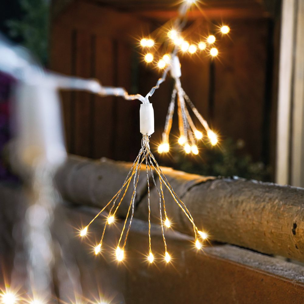Guirlande lumineuse décorative solaire esotec feu d'artifice avec 100 led blanc chaud 102575