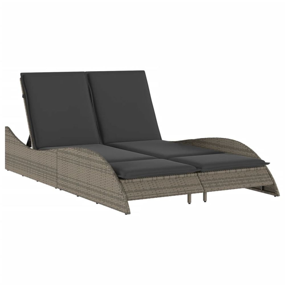 Chaise longue avec coussins gris 114x205x73 cm résine tressée bain de soleil