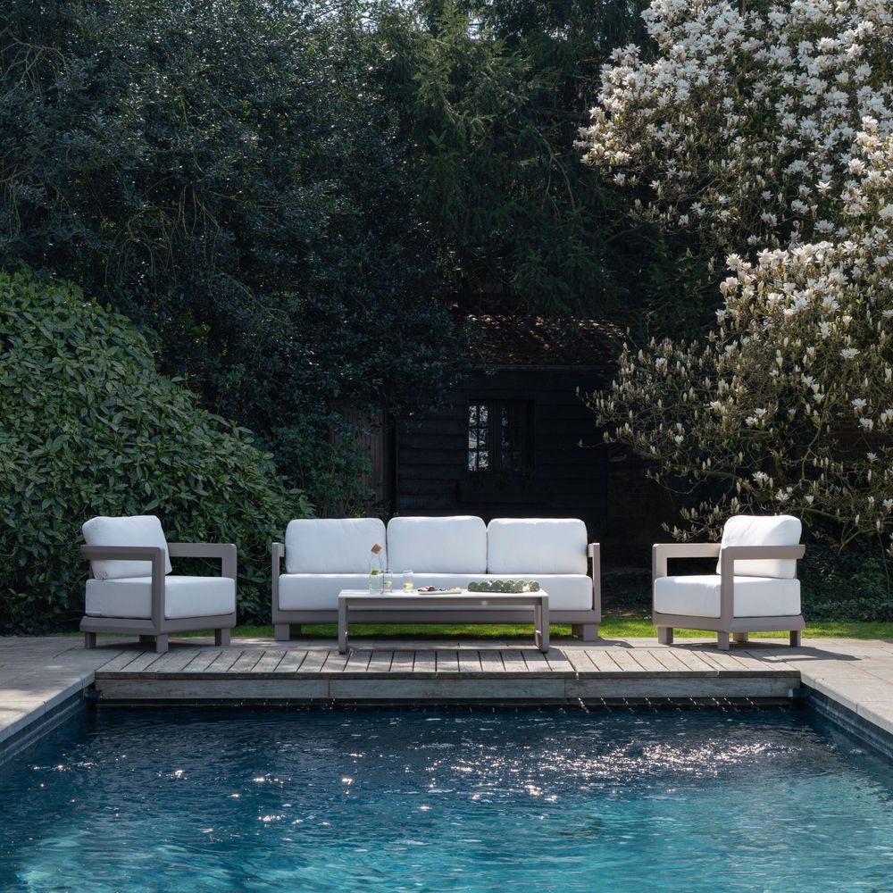 Salon de jardin bas 5p en aluminium taupe avec plateau pierre calarossa