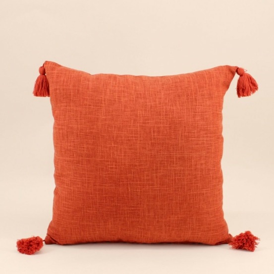 Coussin déperlant tissé orange avec pompons 45x45cm