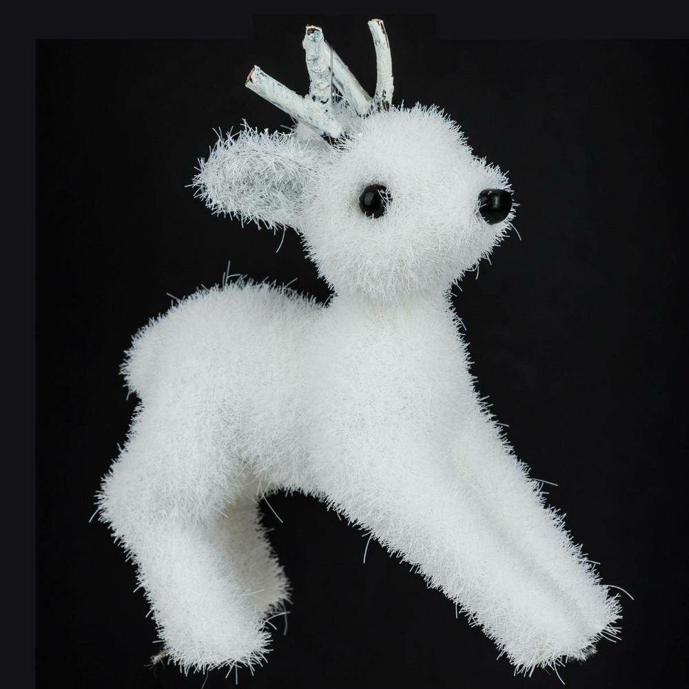 Sujet renne floqué polystyrène avec bois h.12cm