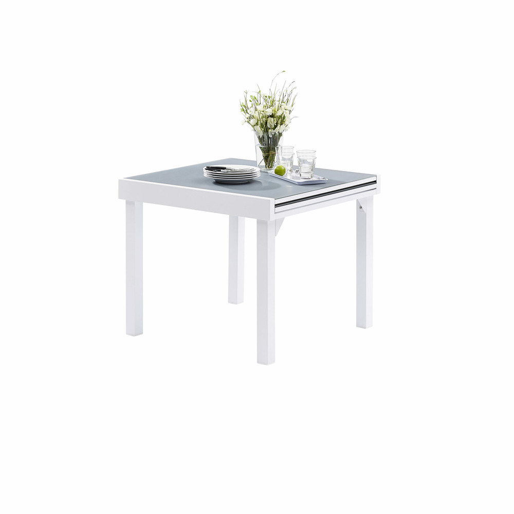 Table modulo 4/8 personnes structure en aluminium blanche, plateau en verre coloris gris perle