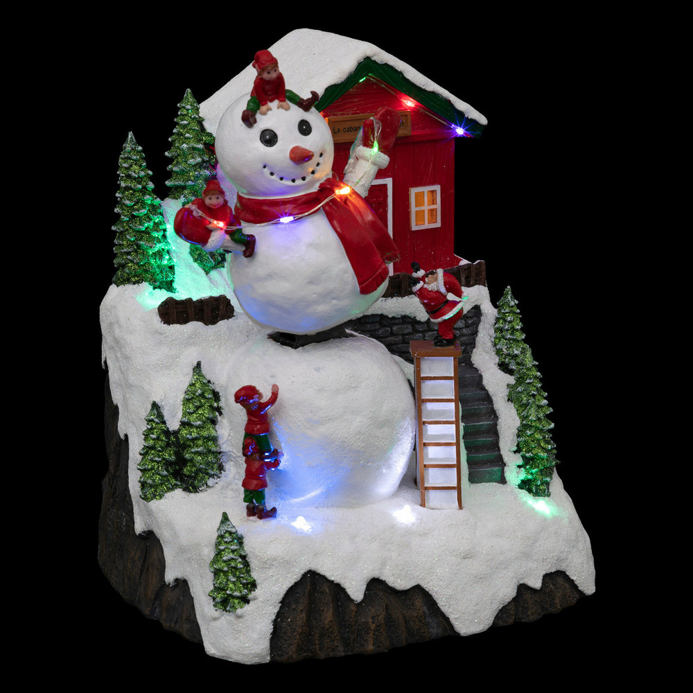 Village de noël lumineux et animé bonhomme de neige en mouvement