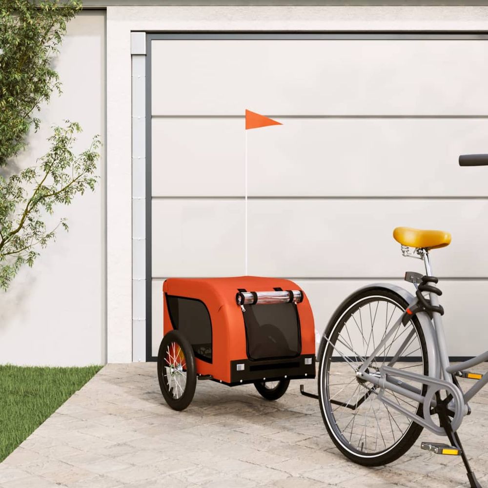 Remorque vélo pour chien tissu oxford et cadre fer pour balades orange