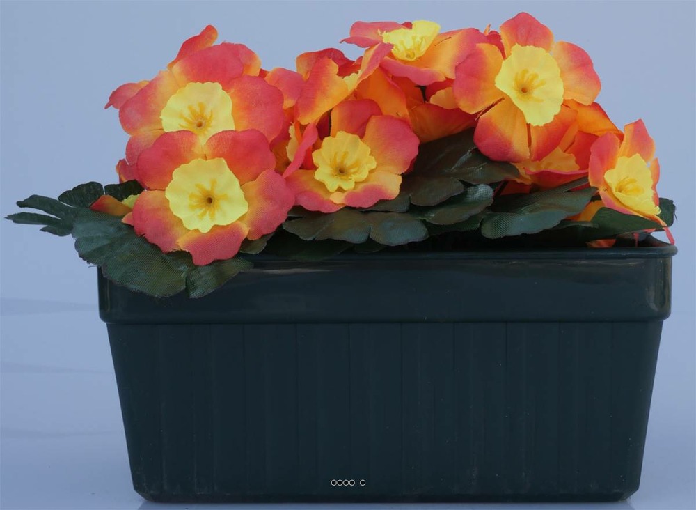 Composition fleurs artificielles cimetière mini jardinière primevères h15 cm l22