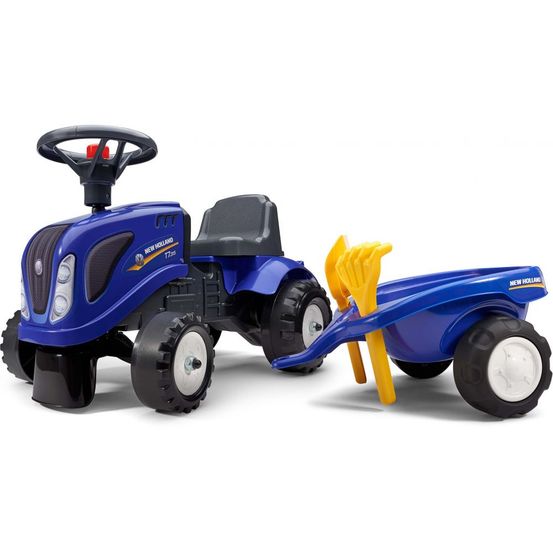 Porteur tracteur new holland avec remorque pelle et rateau