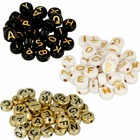 900 perles alphabet blanc/ noir/ doré