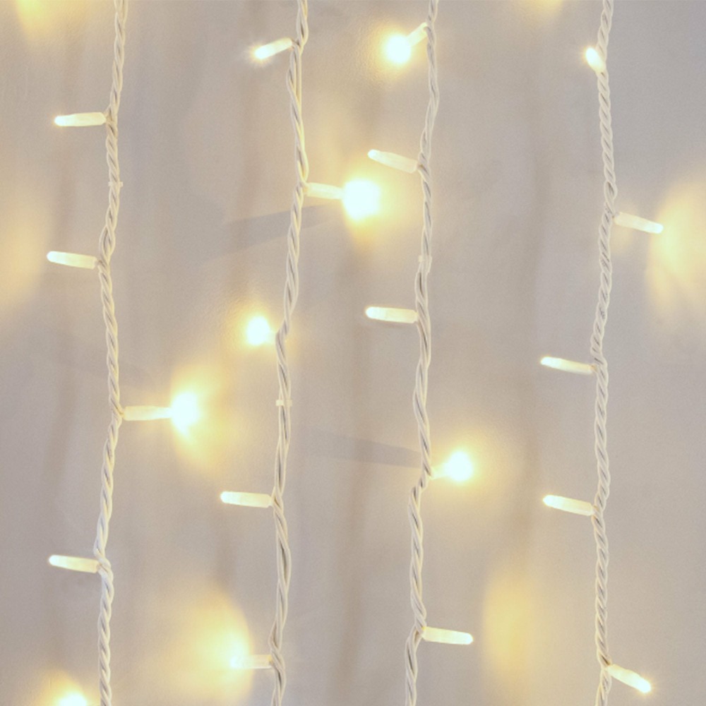 Rideau lumineux blanc chaud l2xh2m 105 led prolongeable int/ext