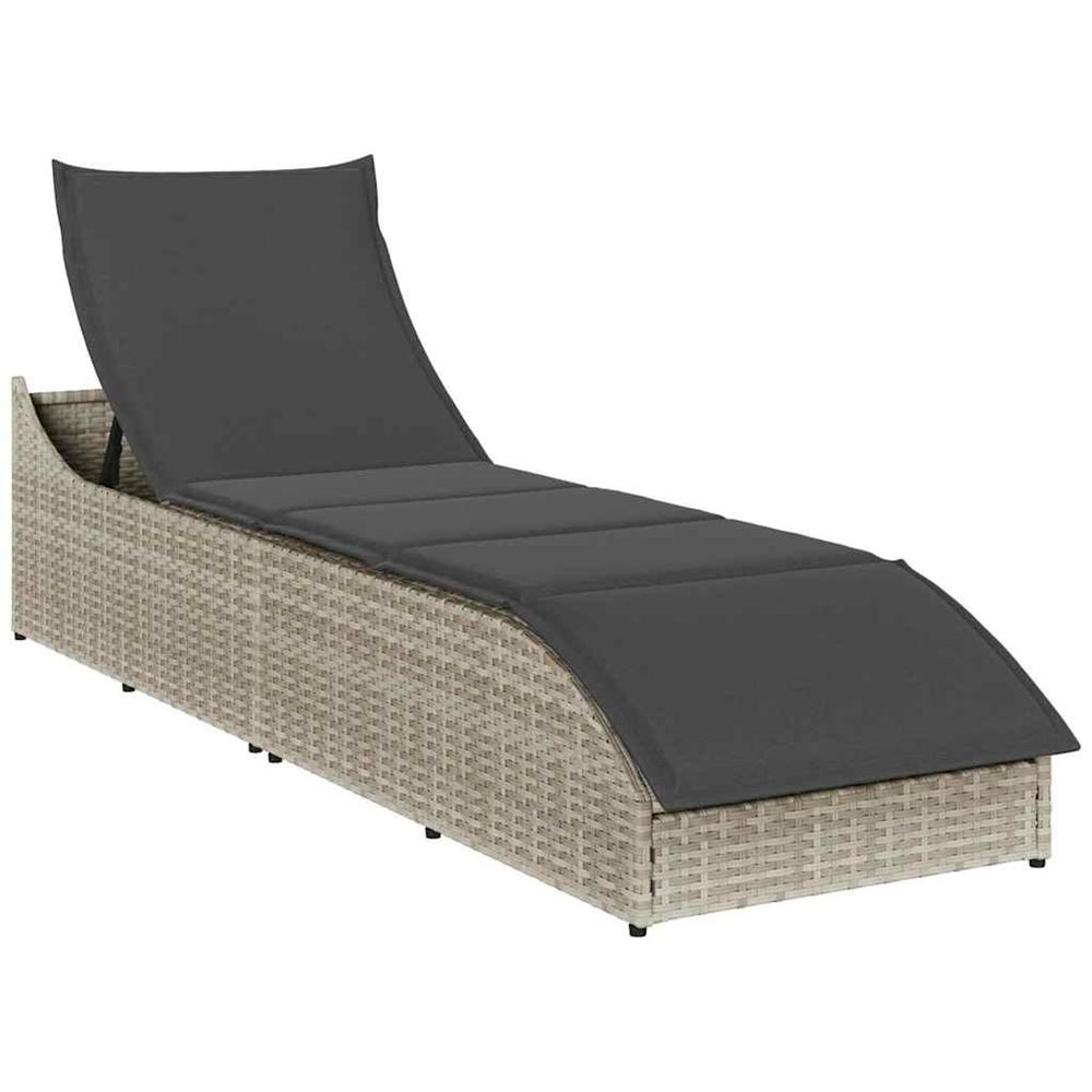 Chaise longue pliante coussin et rangement gris clair polyrotin bain de soleil