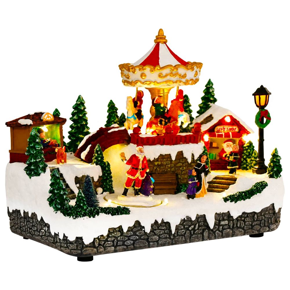 Scène de village de noël avec carrousel salo