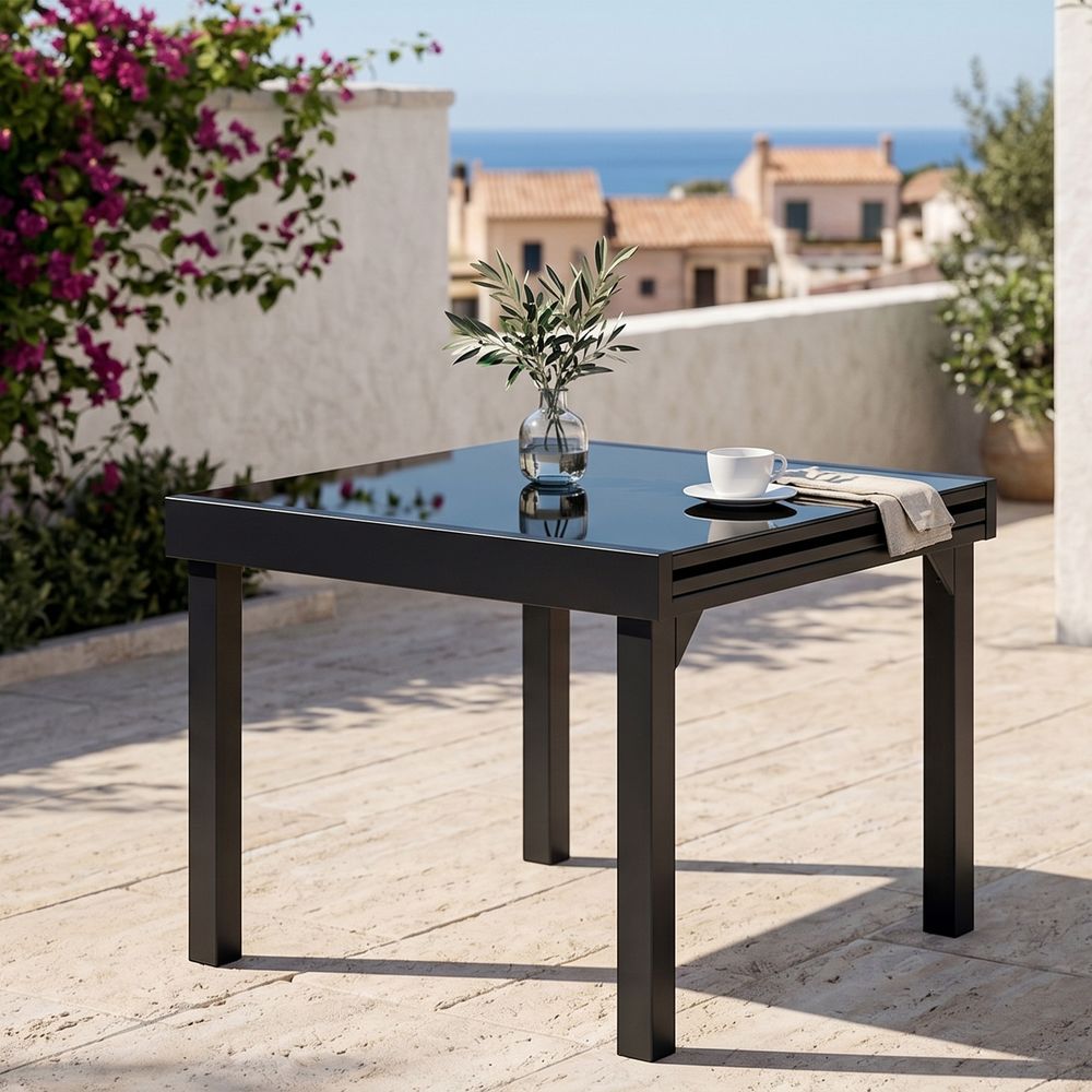 Table modulo 4/8 personnes structure en aluminium noire, plateau en verre noir
