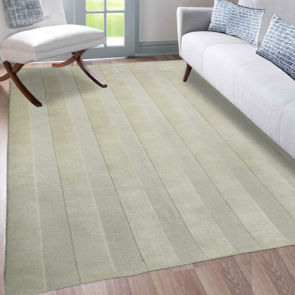 Tapis chambre 160x230 fait à la main en laine beige rectangle motif uni banda