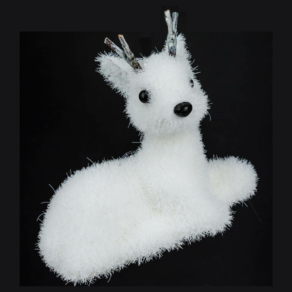 Sujet renne floqué polystyrène avec bois h.12cm