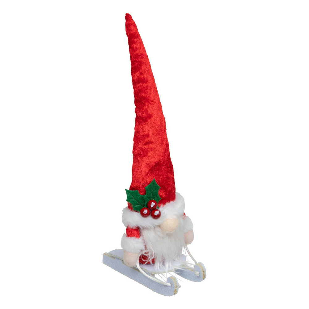 Gnome en père noël sur une luge l 11 x h 25 cm