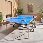 Table de ping pong indoor bleue - table pliable avec 4 raquettes et 6 balles. Pour utilisation intérieure. Sport tennis de table