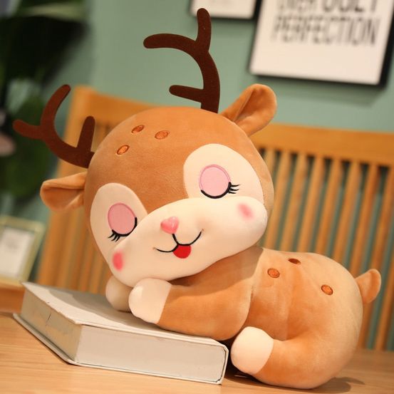 Peluche de noël - renne endormi rose 20 cm