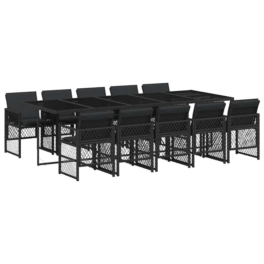 Ensemble à manger de jardin 11 pcs coussins noir résine tressée