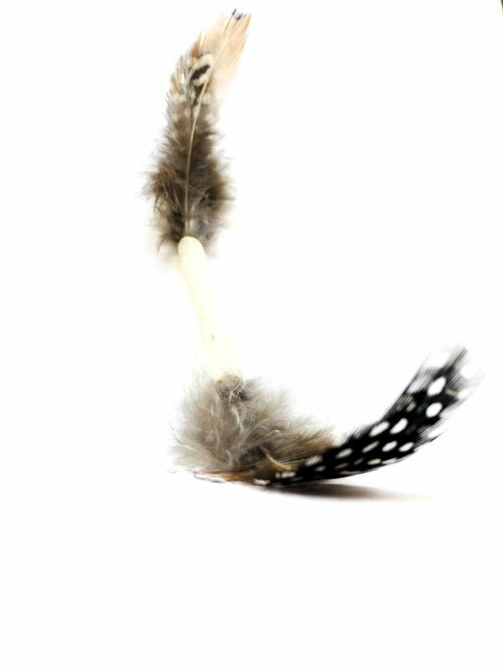 Jouet « Moustache », en bois d’olivier et plumes naturelles | Truffaut