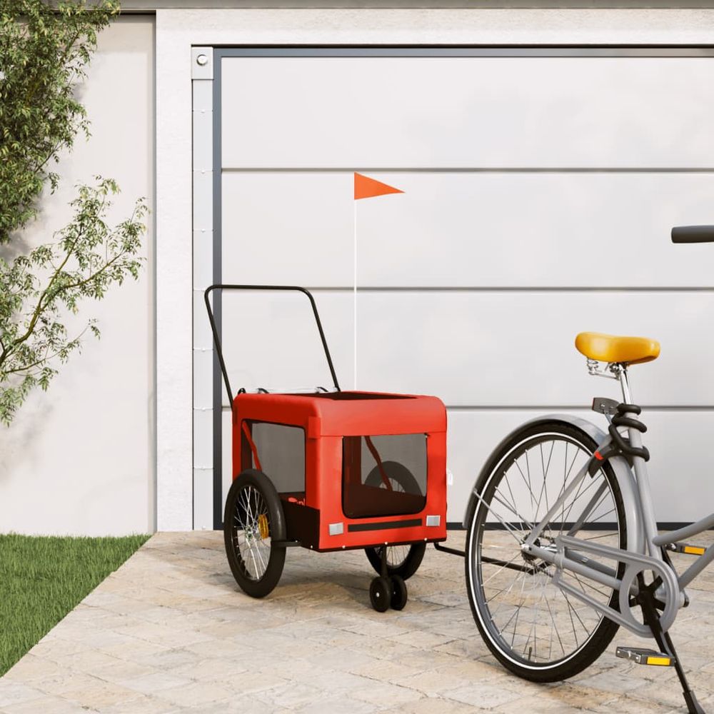 Remorque vélo et poussette pour chien 45kg transport sécurisé pliable orange et noir