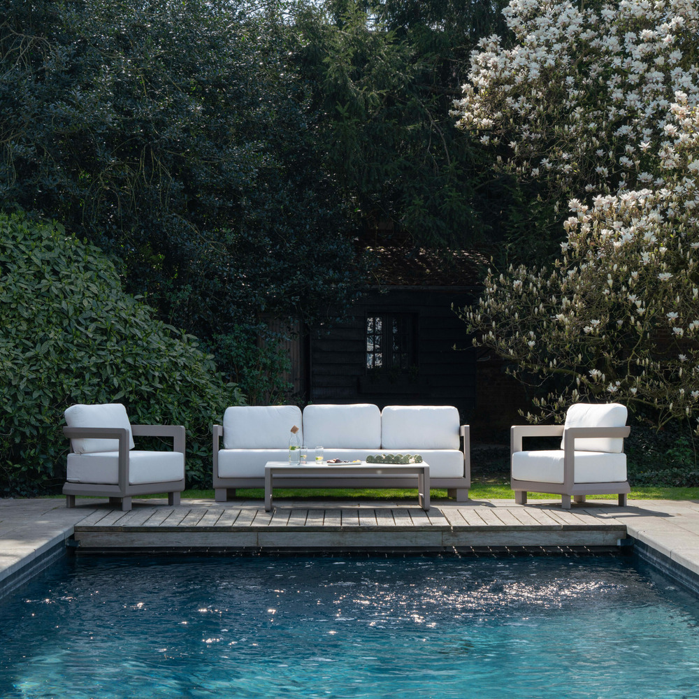 Salon bas 5p en aluminium taupe et plateau en pierre ivoire calarossa