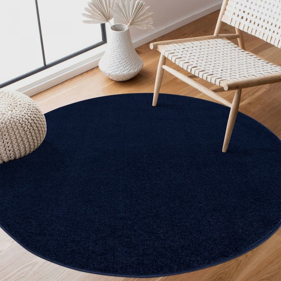 Tapis rond salle de réception ø120cm tissé bleu marine rond motif uni nossa