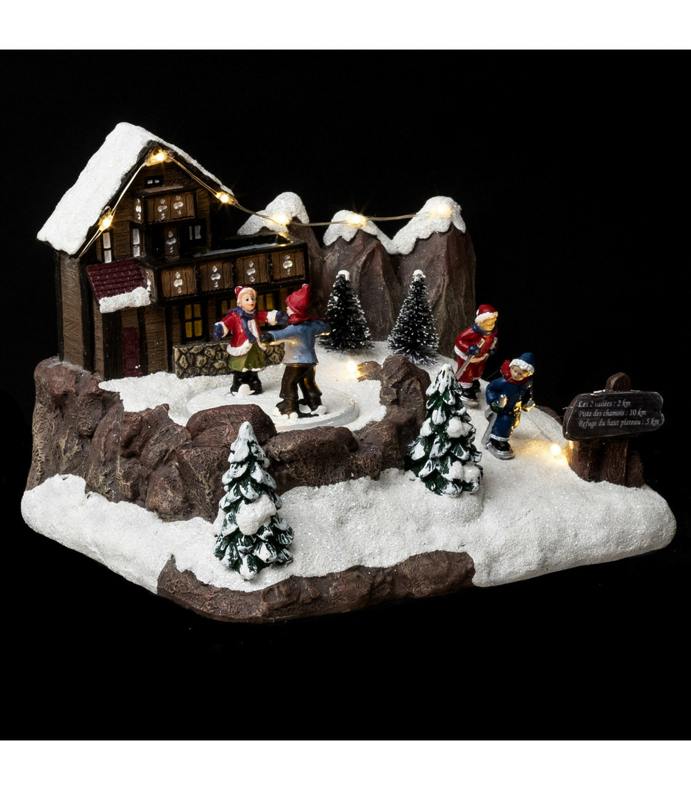 Village de noël lumineux et animé randonnée à ski