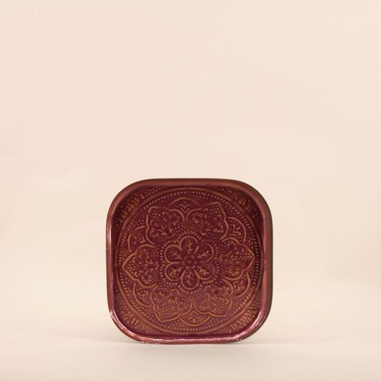 Plateau en métal avec motifs en relief 26cm
