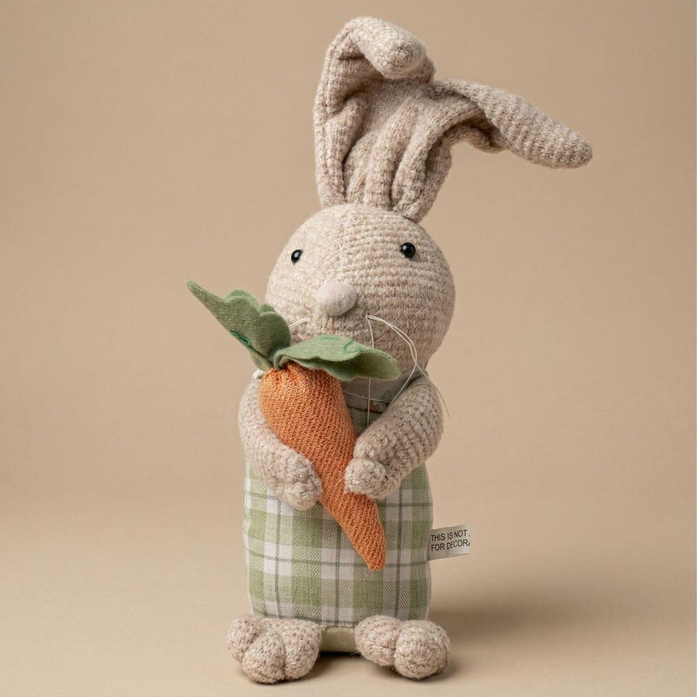 Décoration lapin de pâques en peluche lesté avec carotte - ↕30cm