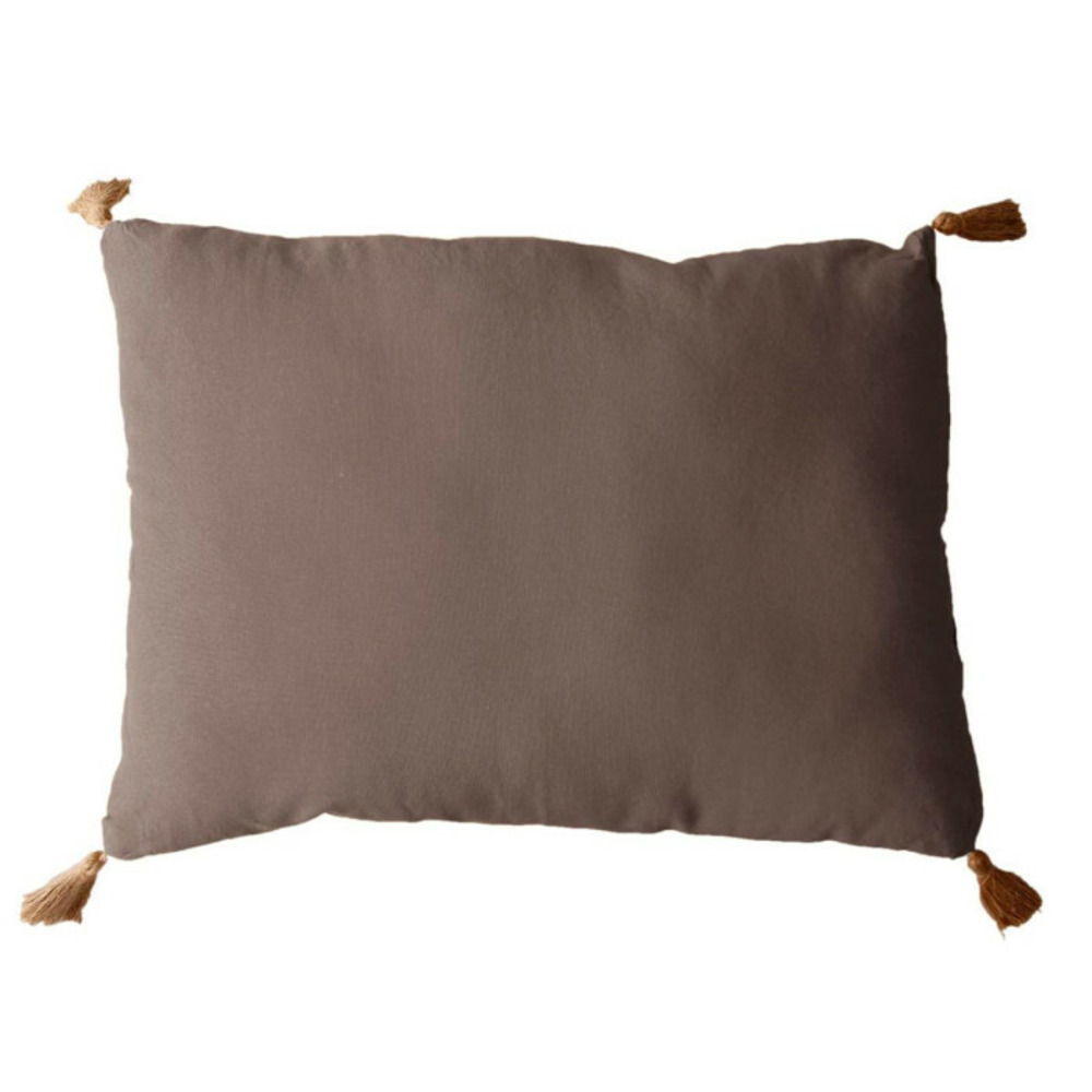 Coussin déco uni à pompons 