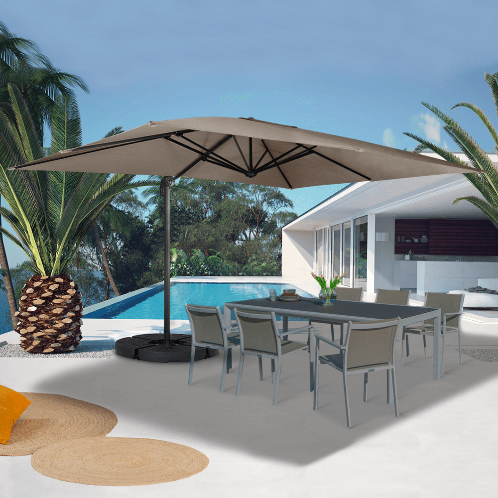Parasol déporté inclinable rotatif 360 calvi taupe 3x4 m avec 4 dalles et housse