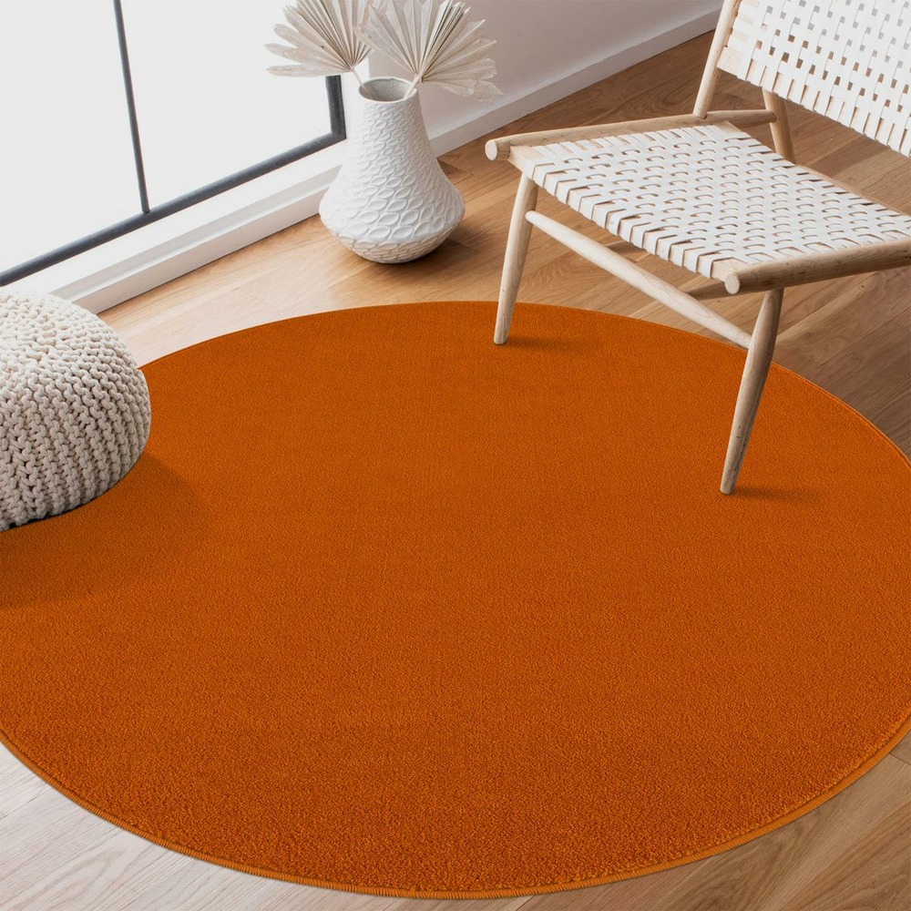 Tapis rond salle de bain ø80cm tissé orange rond motif uni nossa
