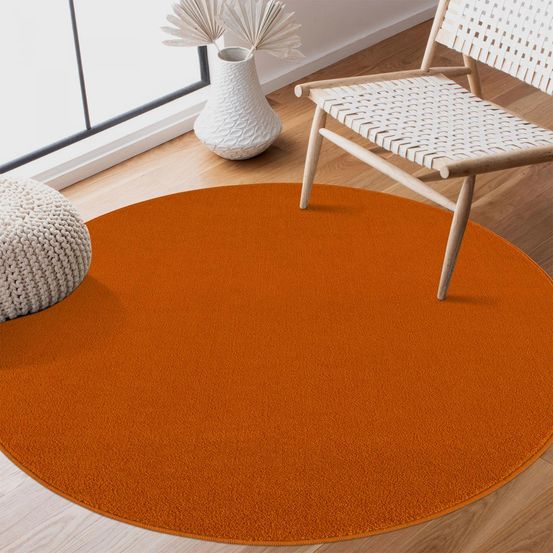 Tapis rond salle de bain ø80cm tissé orange rond motif uni nossa