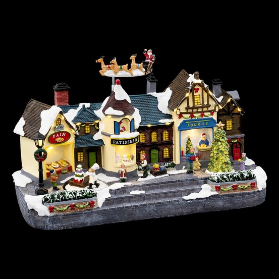 Village de noël lumineux et animé les boutiques de noël en ville