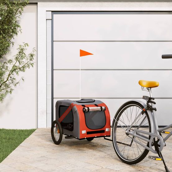 Remorque vélo chien en acier transport confortable et sécurisé orange et noir