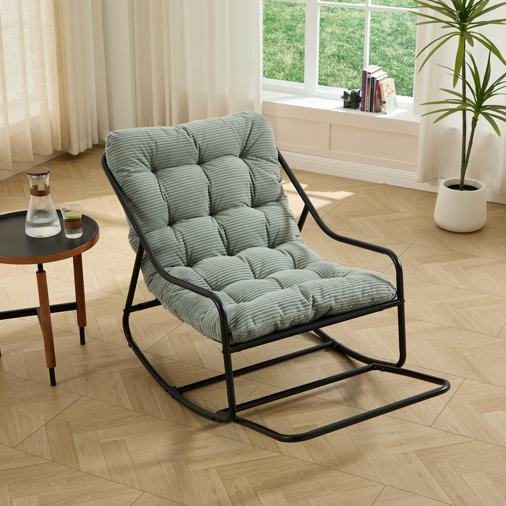 Fauteuil à bascule confortable avec rembourrage épais, pour salon, chambre, jardin et terrasse. Structure noire, coussin blanc.