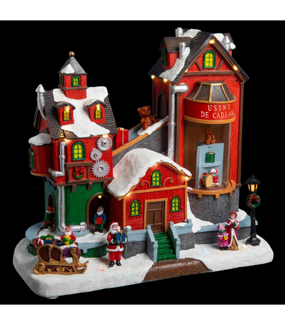 Village de noël lumineux, animé et musical la fabrique de cadeaux en laponie