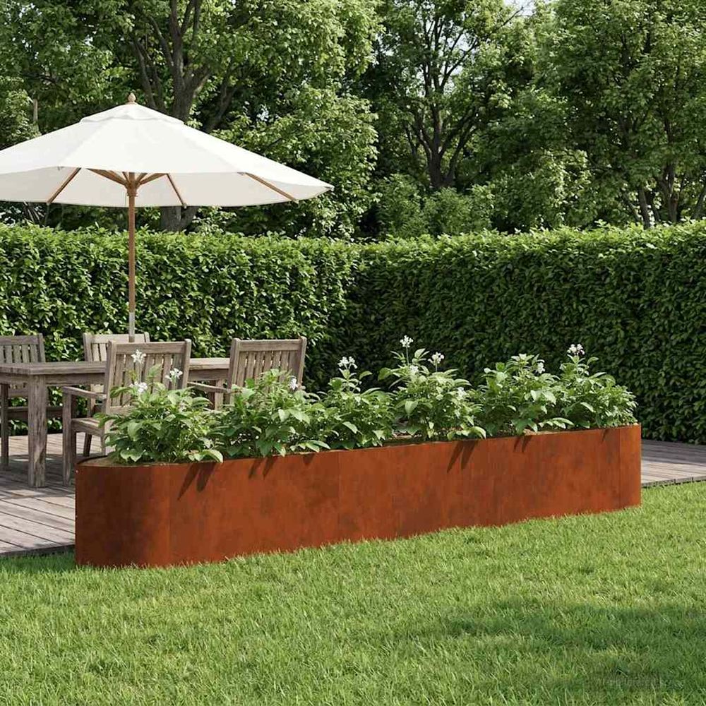 Longue jardinière surélevée acier patiné aménagement extérieur croissance libre 300x40cm