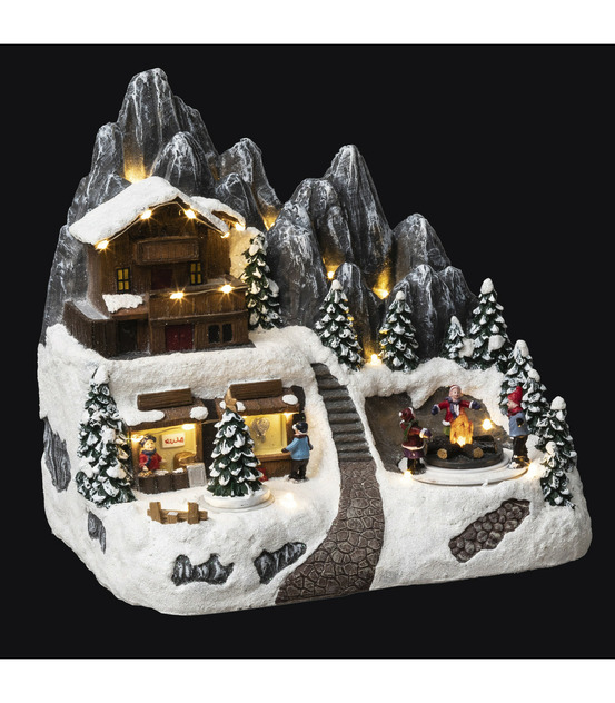 Village de noël lumineux et animé refuge en altitude