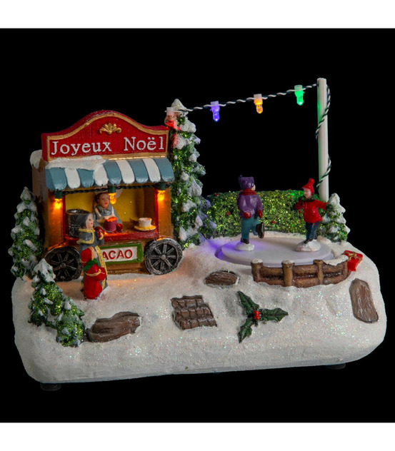 Village de noël lumineux patinoire animée